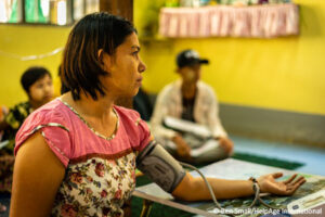 A woman having blood pressure test